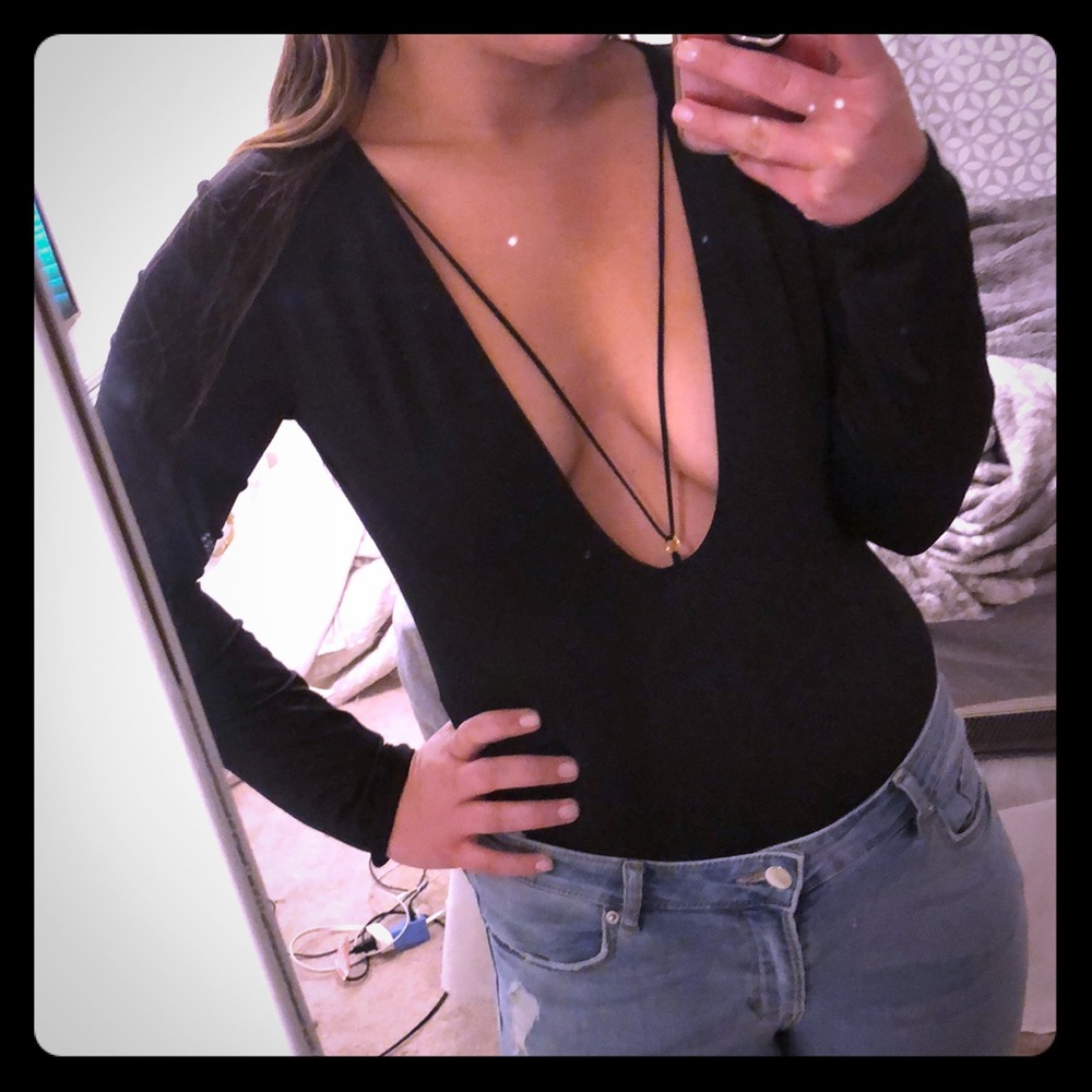 Low cut black body suit